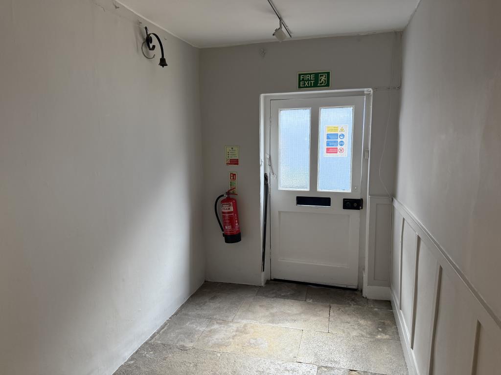 Lot: 83 - FREEHOLD TOWN CENTRE COMMERCIAL INVESTMENT AND UPPER FLOORS WITH POTENTIAL - The Side Access to the Building